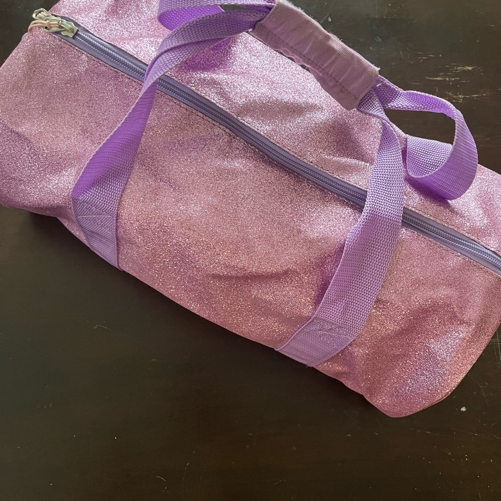 Purple sparkly bag with long strap